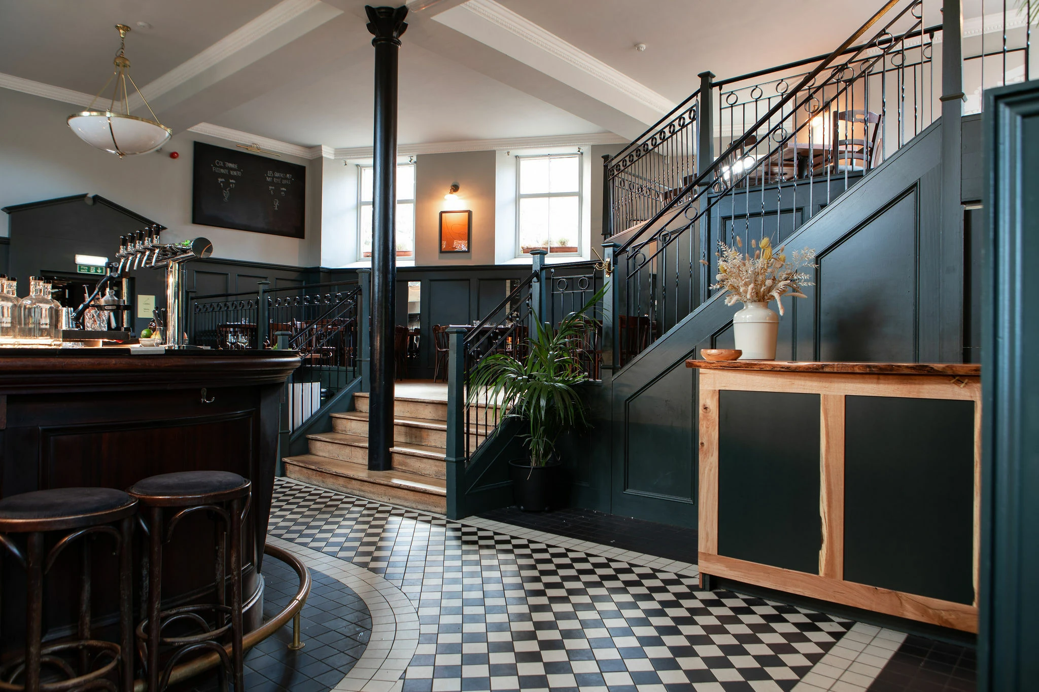 The interior of a restaurant with check floor