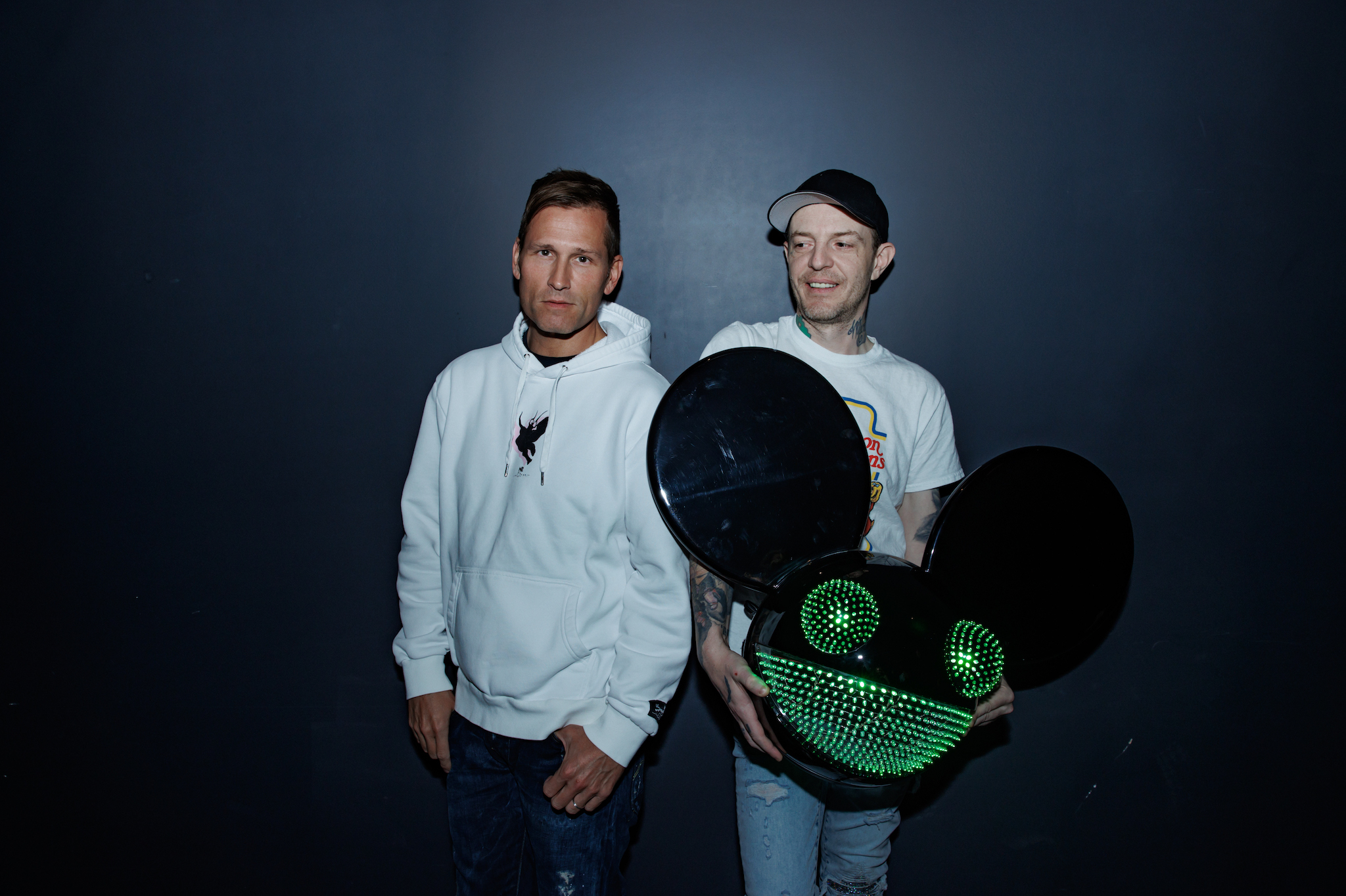 A portrait of deadmau5 and Kaskade.