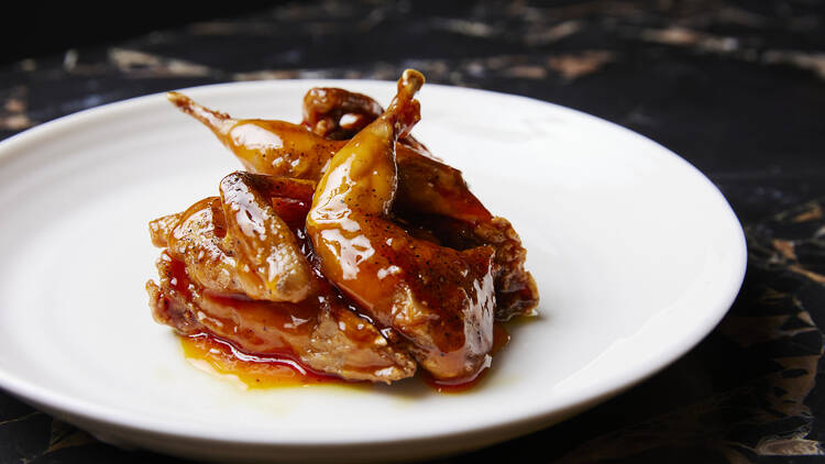 Sweet and sour quail on a plate.