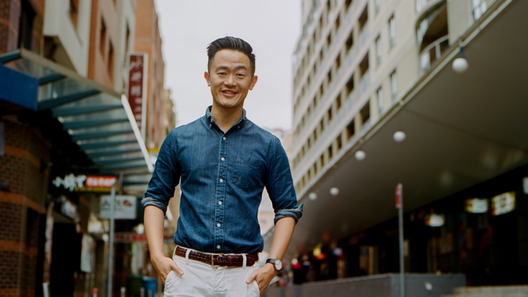 Ben Law standing in Sydney city.