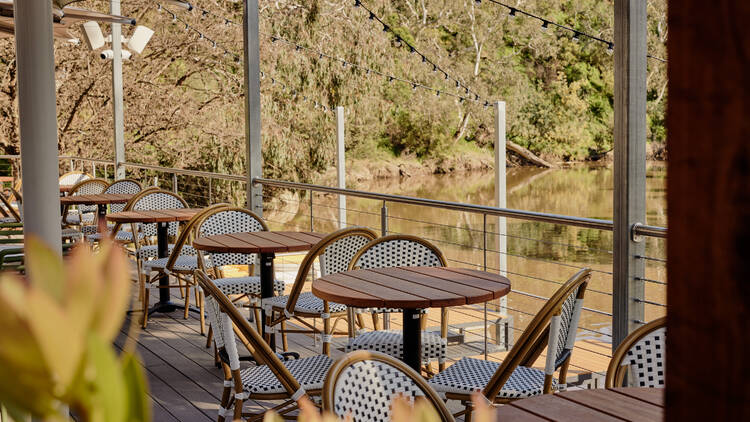 The outdoor dining deck at Studley Park Boathouse.
