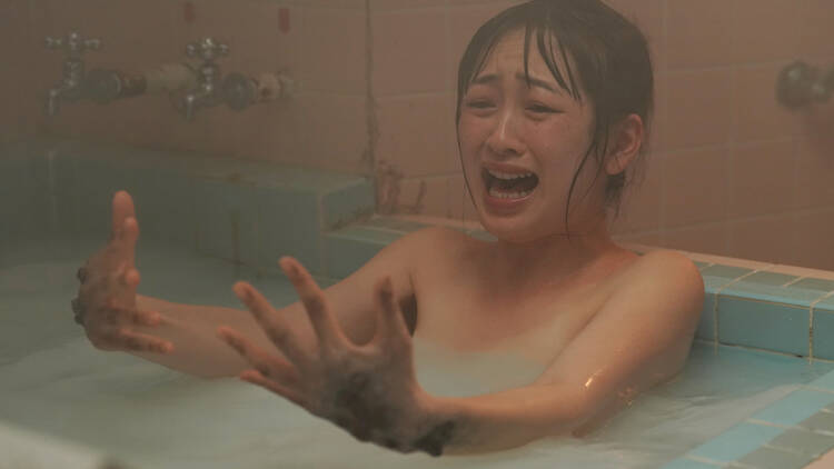 picture of Japanese woman in the bath screaming