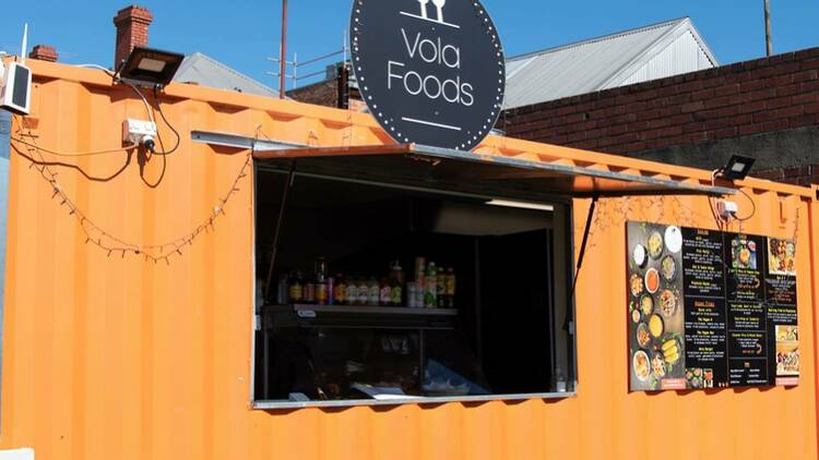 Vola Foods' orange shipping container. 