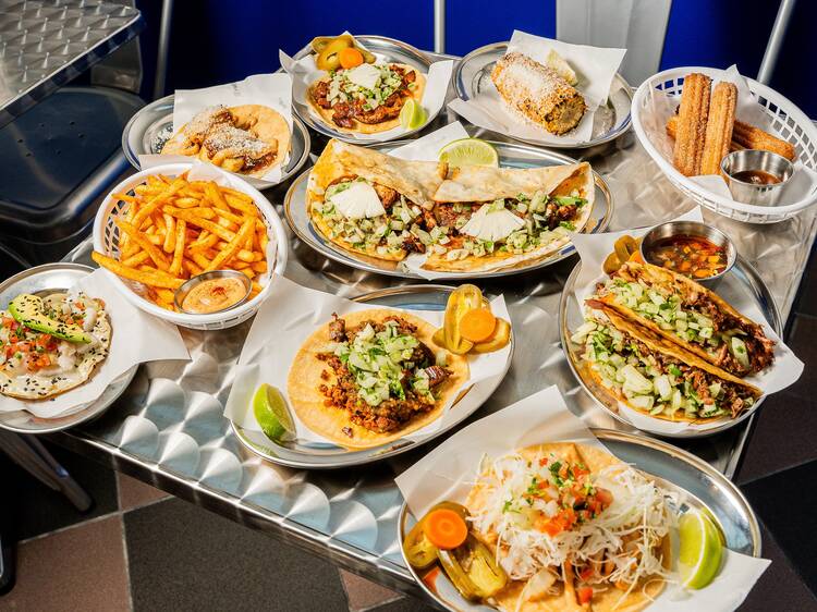 Assorted plates of Mexican food.