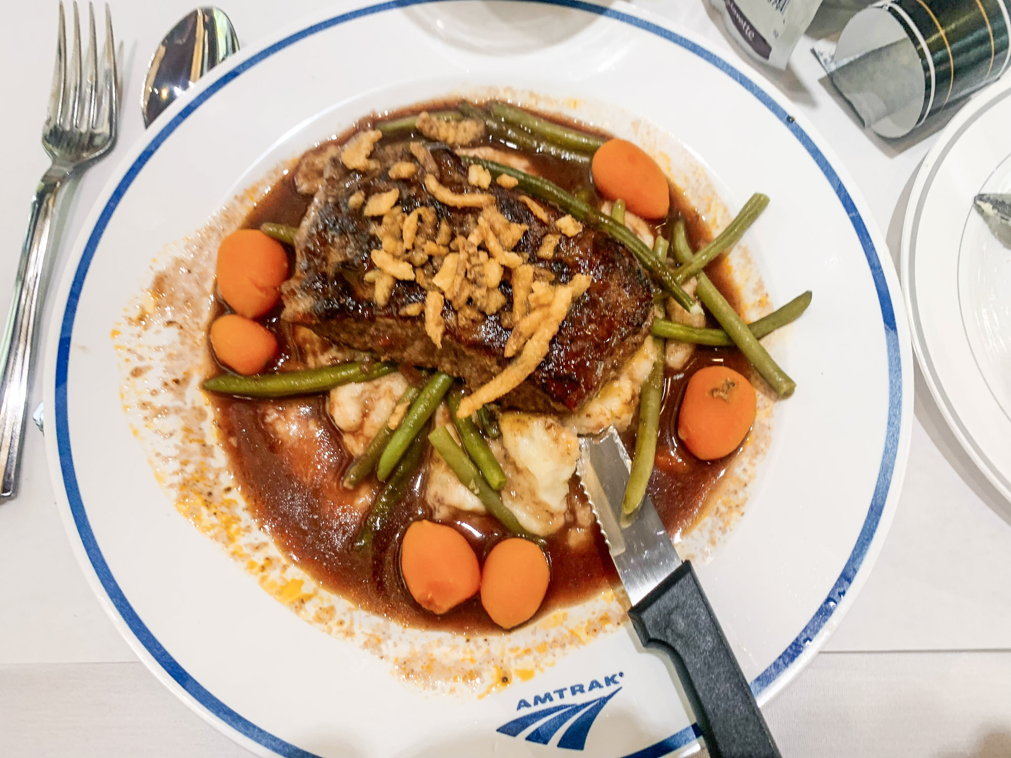 A steak dinner aboard the Amtrak sleeper train