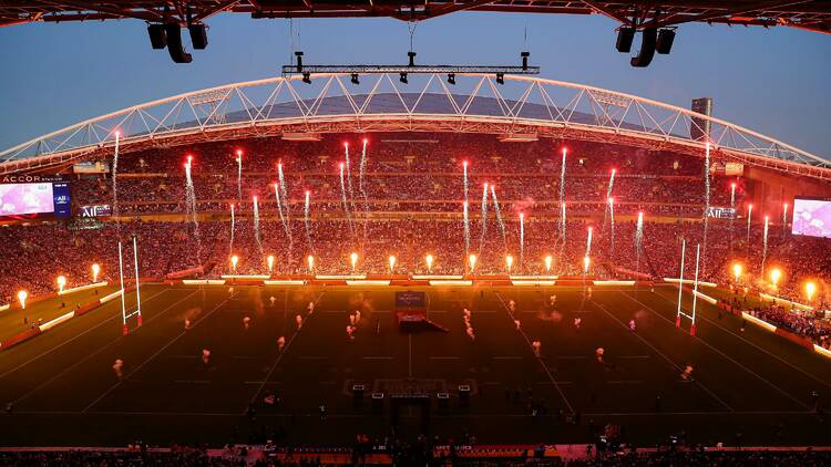 A stadium lit up with fireworks