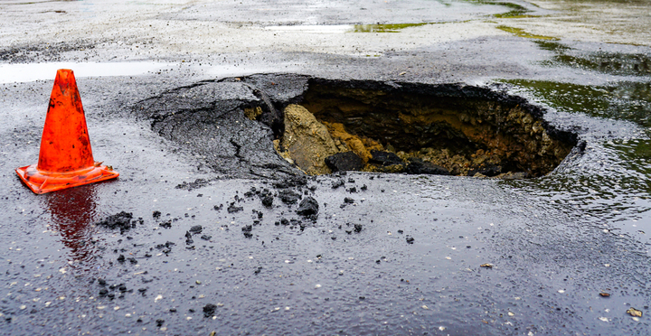 A car-sized sinkhole has appeared on a south London street