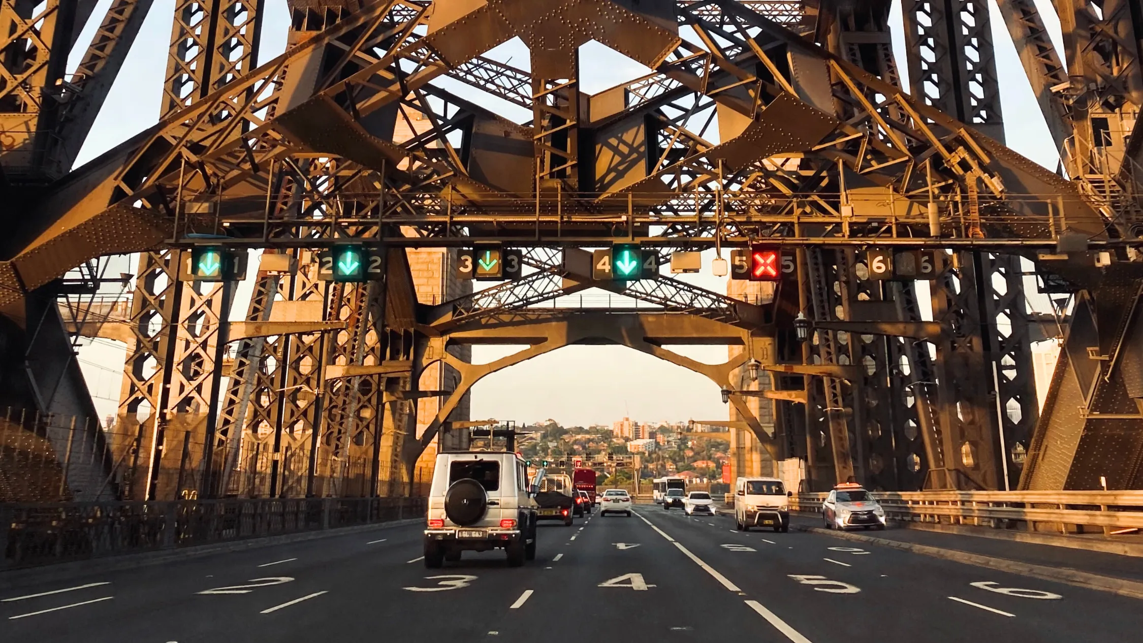 Cars driving across the Sydney Harbour Bridge