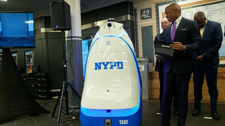NYPD’s robotic k5 unit standing next to the mayor