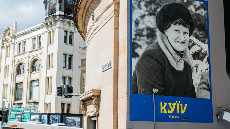 a striking mural of Ukrainian woman and Kyiv Social restaurant consultant Nadia Mohylna