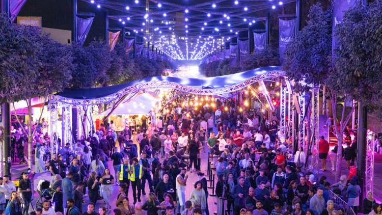 A winter wonderland outdoor festival with fairy lights