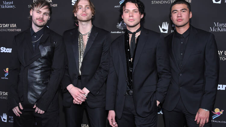 The four members of 5 Seconds of Summer wearing all black
