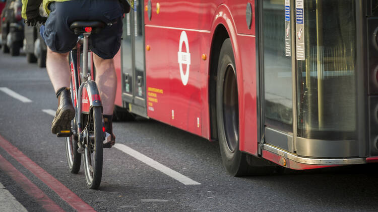 Cyclist and bus in London
