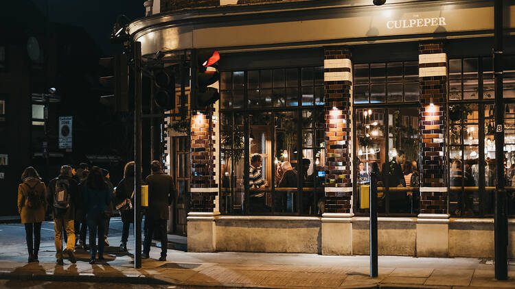 The Culpeper pub, London, at night