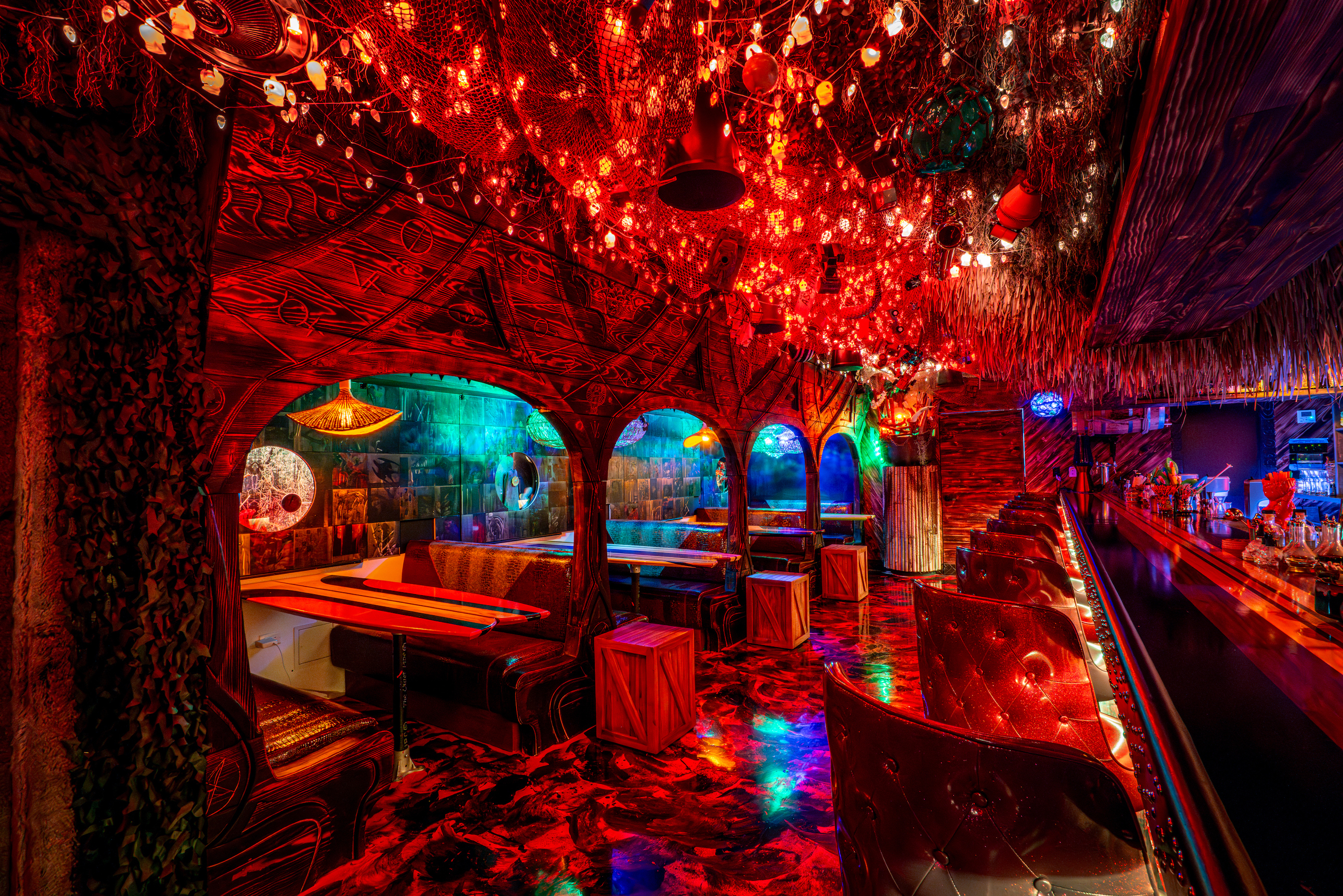 This downtown bar is a “tropical hellscape” of food and drinks