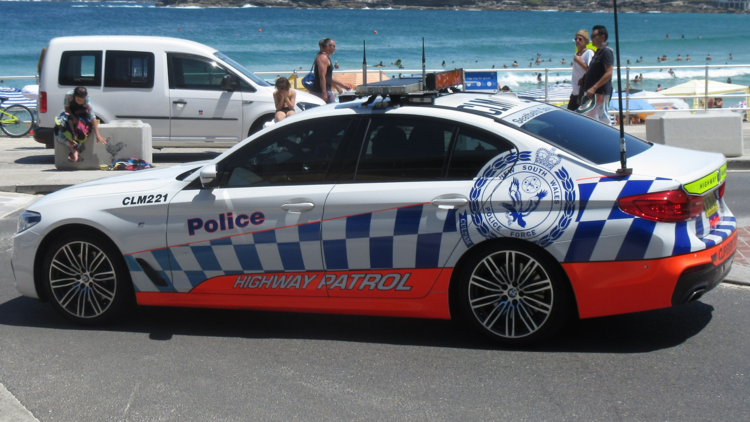 police car at the beach