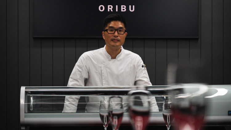 Japanese chef looking at camera