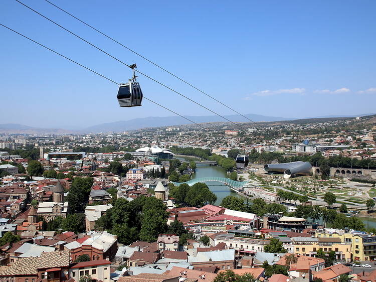 Take a cable car to the Mother of Georgia