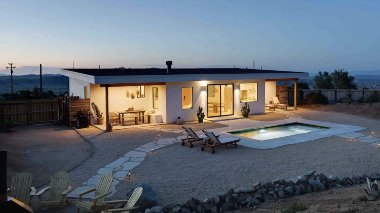 A two-bedroom desert house with a private pool and hot tub