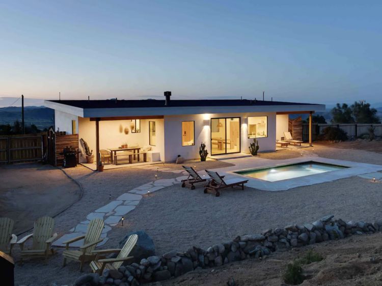 A two-bedroom desert house with a private pool and hot tub