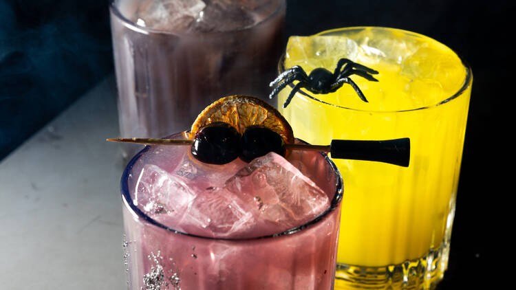 Three cocktails on a table.