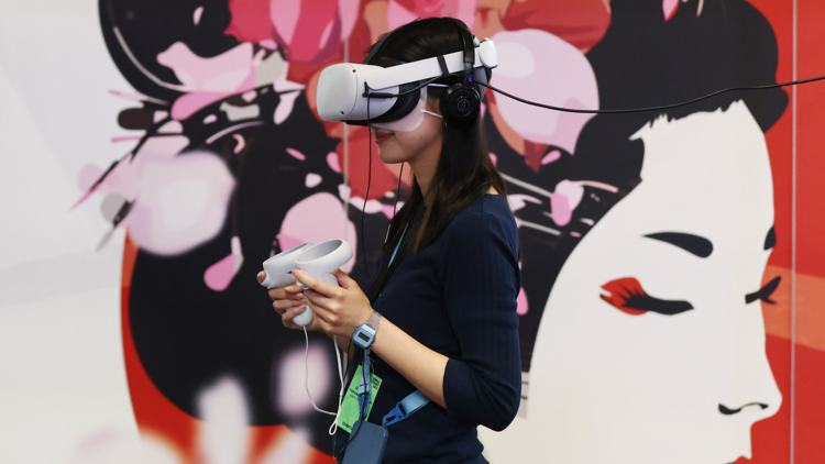 A woman with a VR headset on