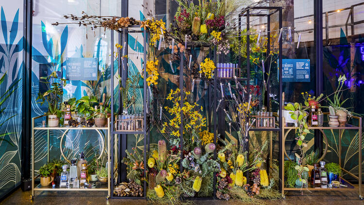 A botanical display of Australian flowers at The Greenhouse Bar.