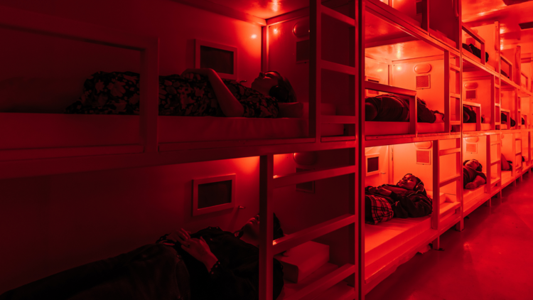 A neon bunk bed room