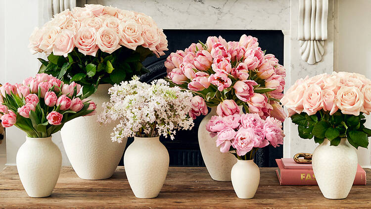 Six bouquets of various flowers from Flowerbx, including two bunches of pink sweet avalanche roses.