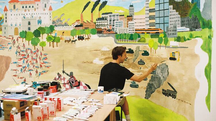 picture of jean jullien painting a wall