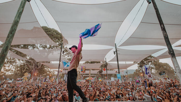 picture of a man waving a flag at pitch festival