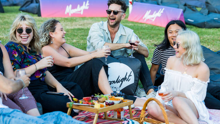 A group of people at the Moonlight Cinema.