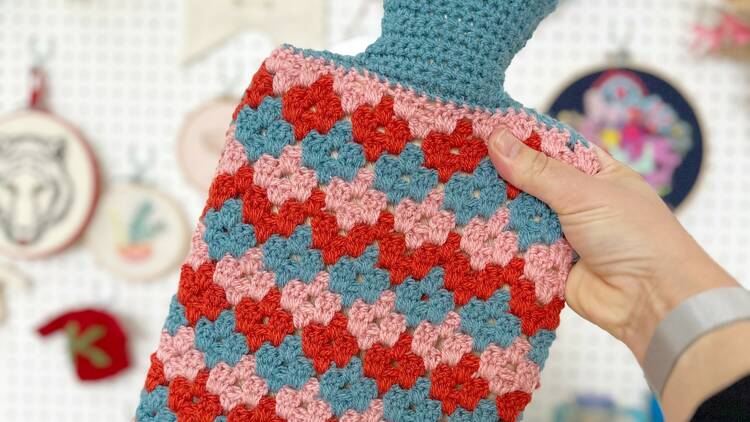 Crochet hotwater bottle cover
