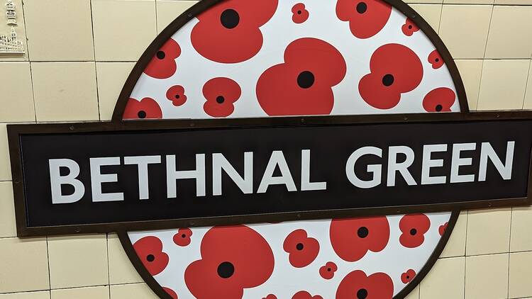A poppy roundel at Bethnal Green station