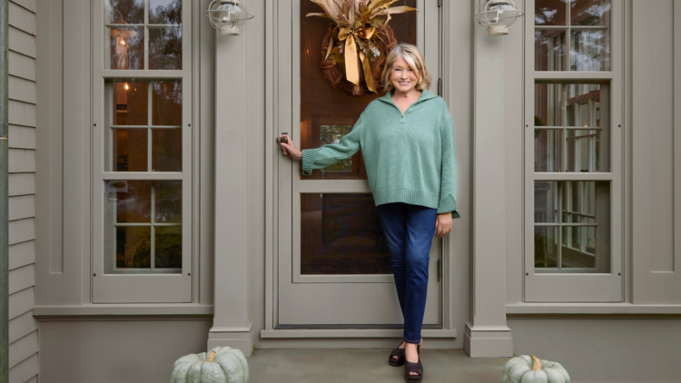 Booking.com -  Martha in front of her home