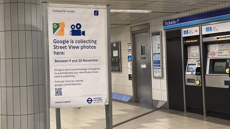 A poster in a tube station saying Google is collecting Street View photos 