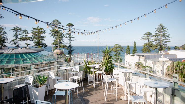 A rooftop bar overlooking the beach