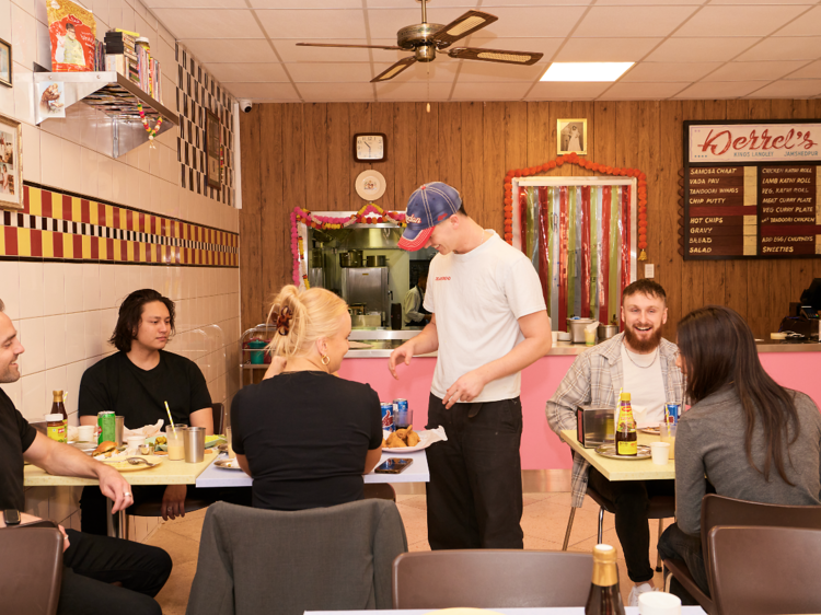 People enjoying food at Derrel's