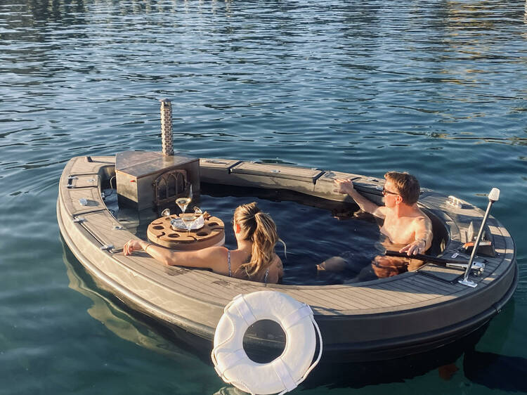 Float down the river in a hot tub boat