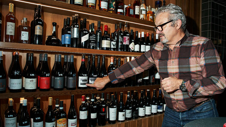 Laurent Rospars pointing out different wines.