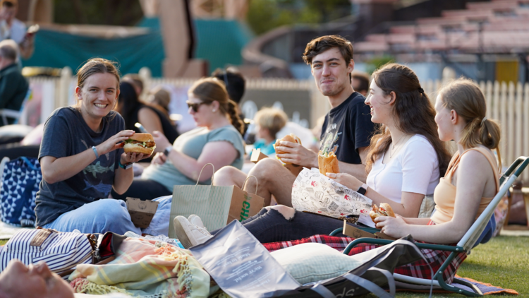 people with food at sunset cinema north sydney