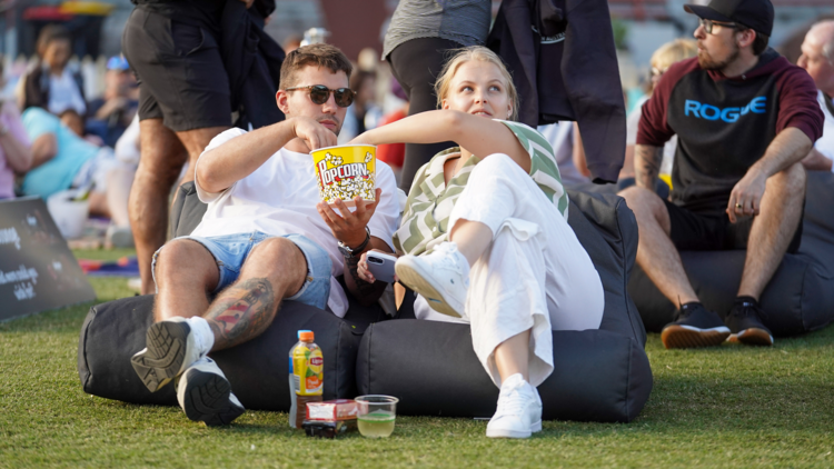 people with popcorn at sunset cinema north sydney