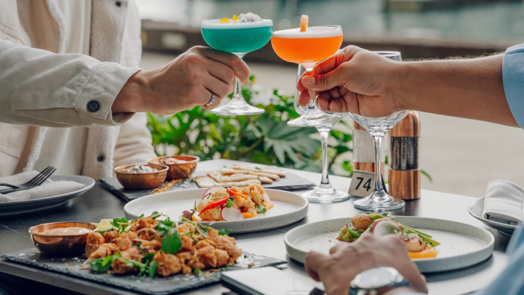 A Christmas dinner at a restaurant with cocktails