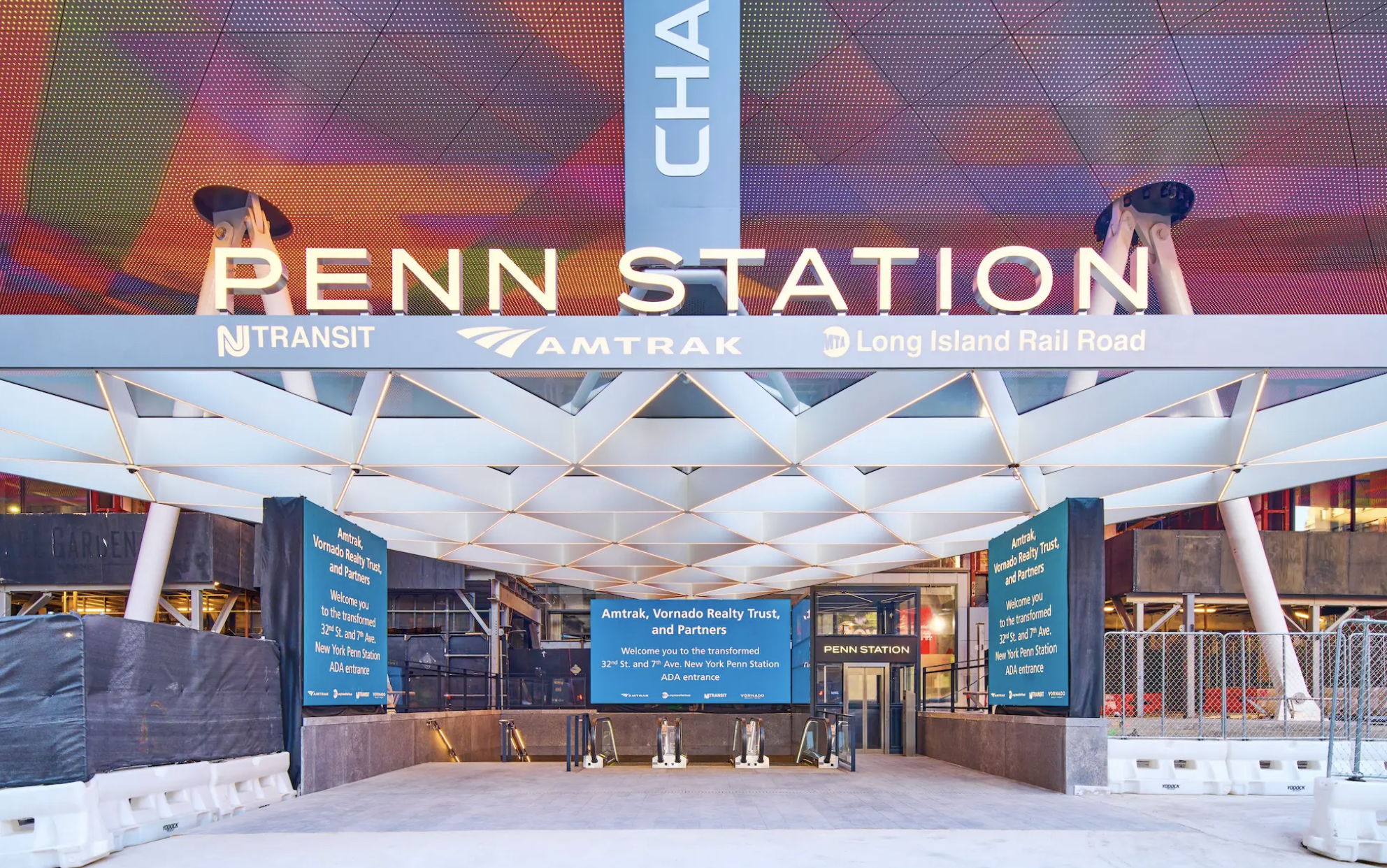 Penn Station’s entrance now features a glass canopy