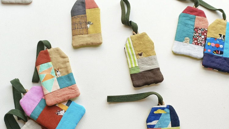 Colourful fabric tags that double as a cardholder