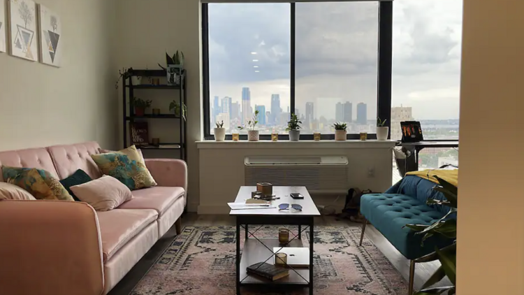 A stylish monthly rental with skyline views near PATH