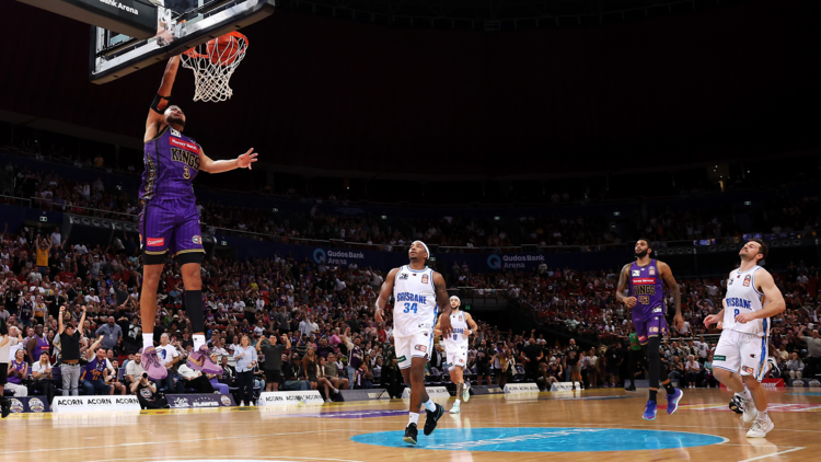 Sydney Kings player doing a slam dunk