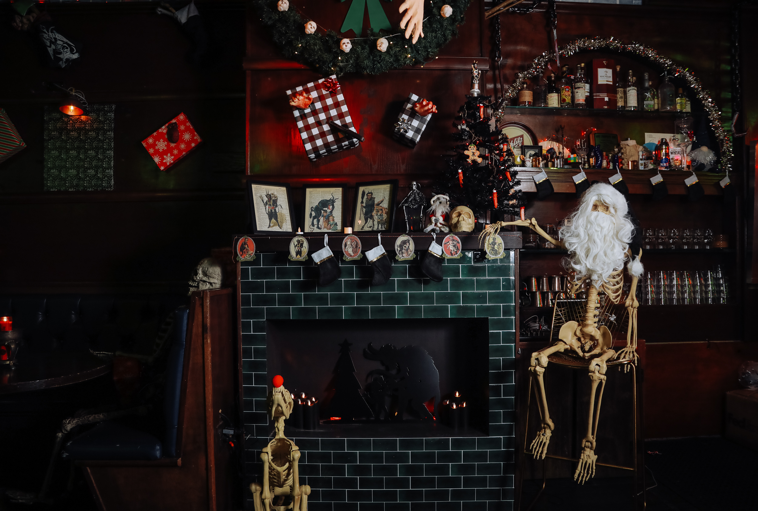 Decor at Krampus' Cove with a skeleton dressed as Santa.