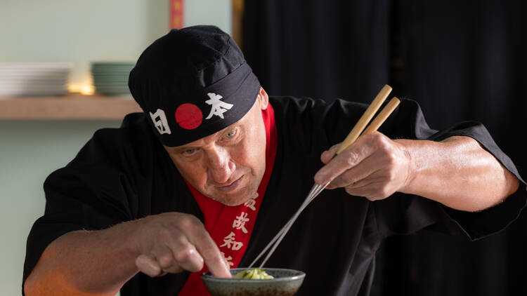 Chef Peterson preparing a dish.