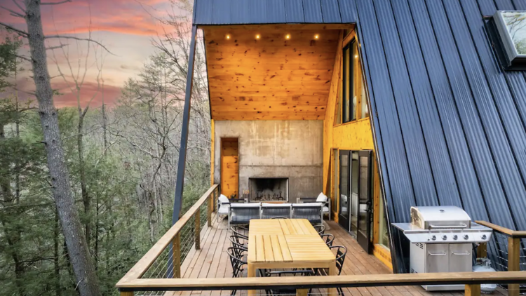 A-frame cabin balcony overlooking the forest in Epworth, Georgia.  